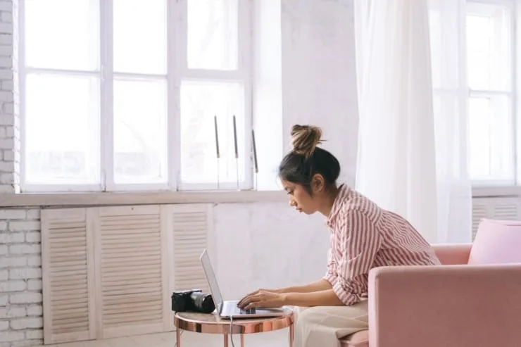 Checking connected devices and accounts on a laptop at home